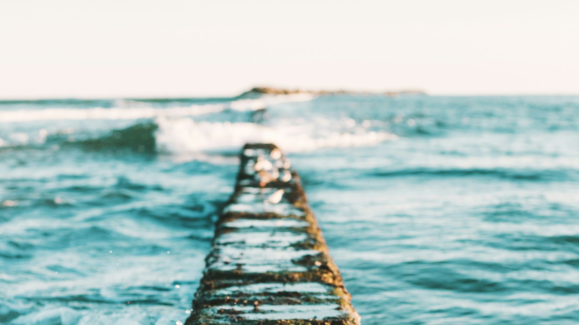gray dock between body of water