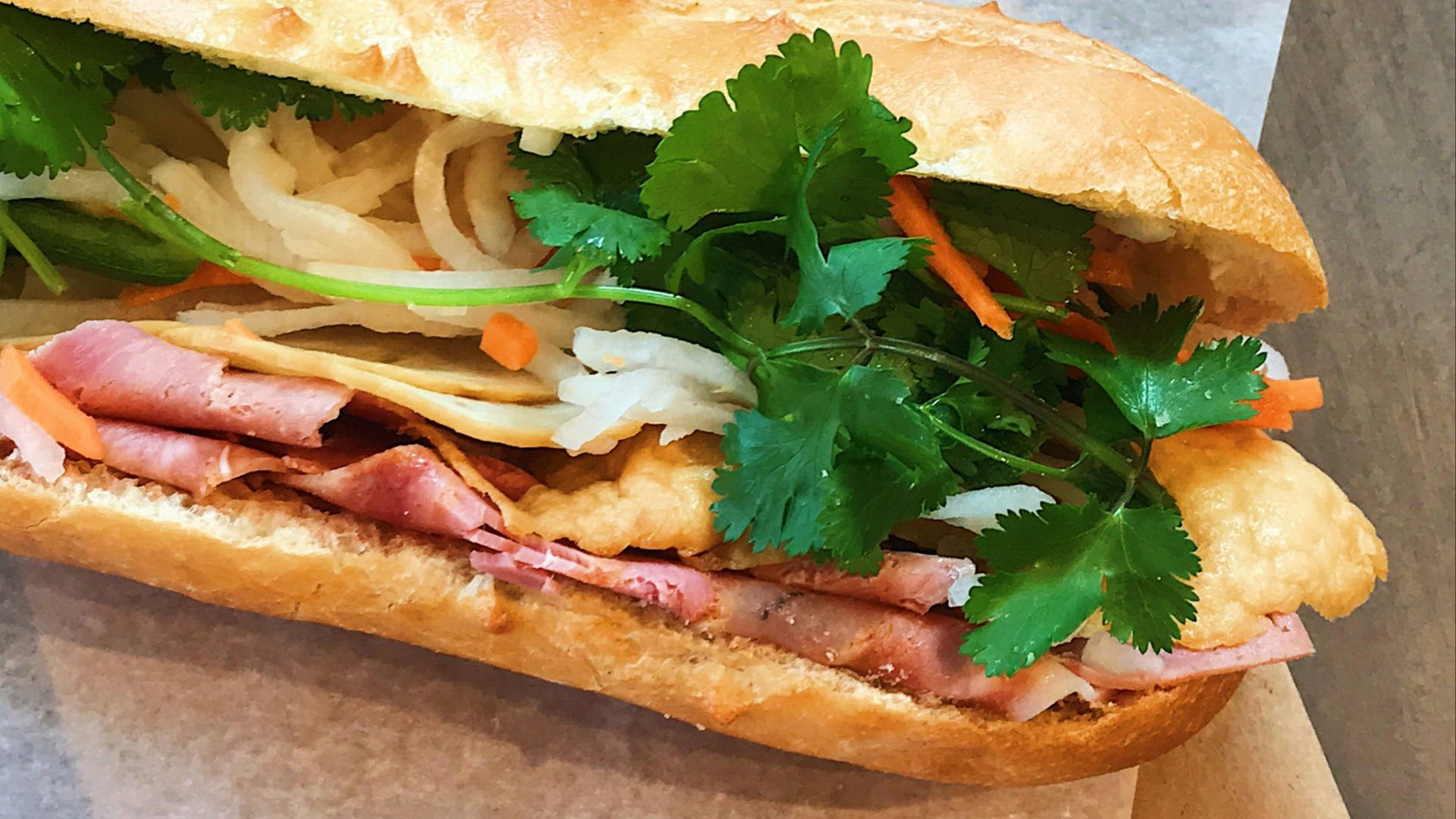 green vegetable on brown bread