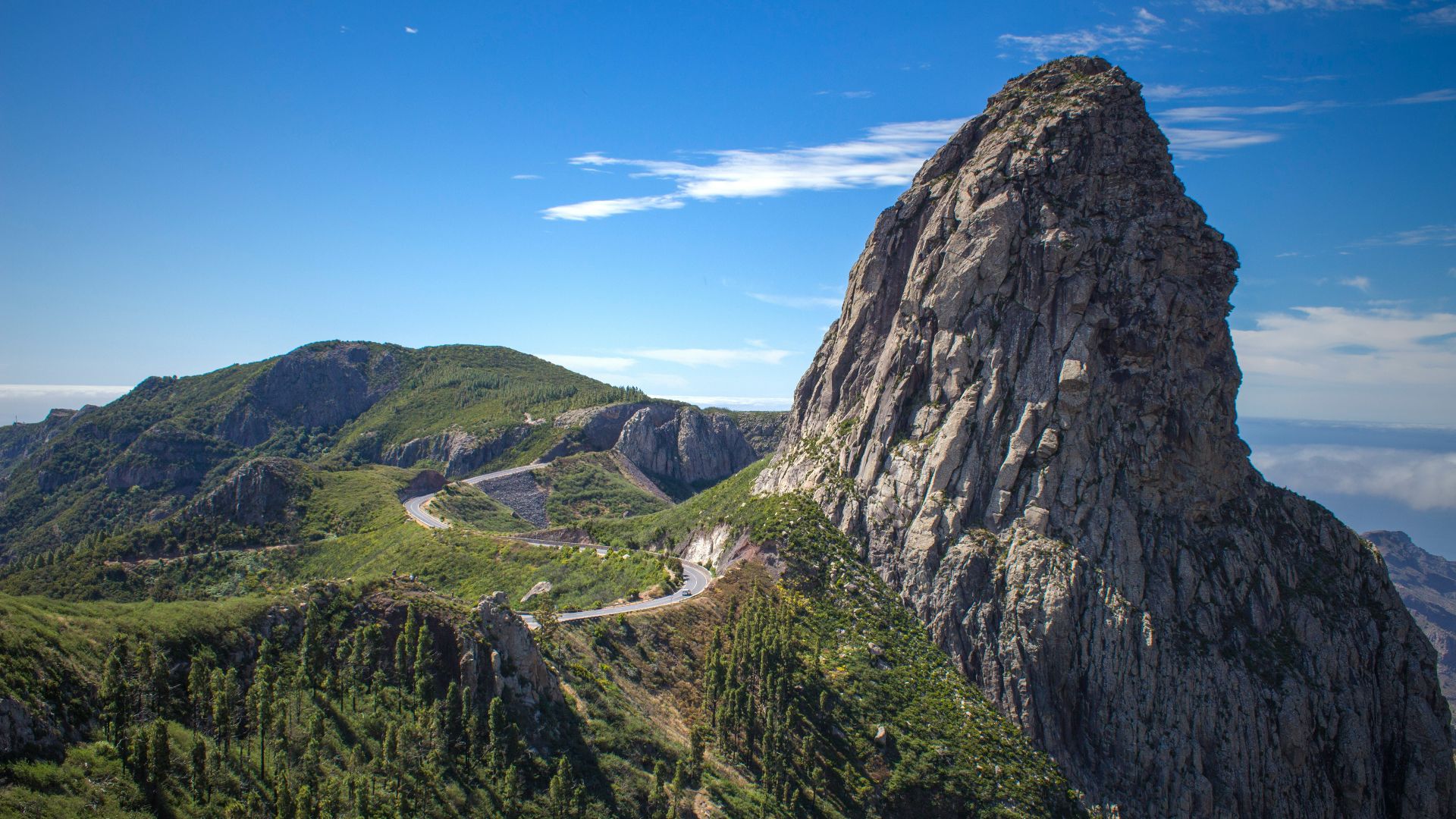 a mountain with a road going through it