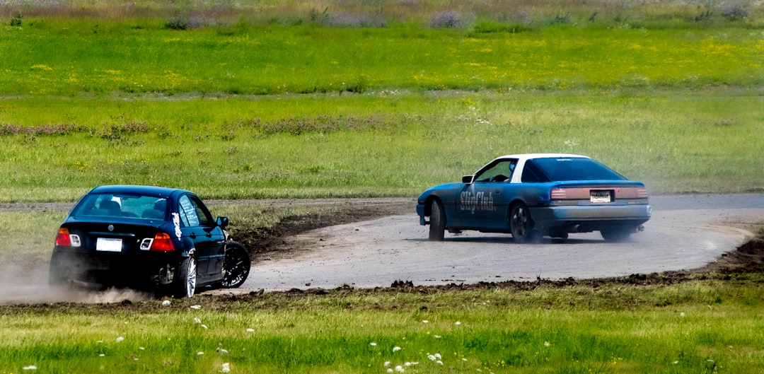 blue car on road during daytime