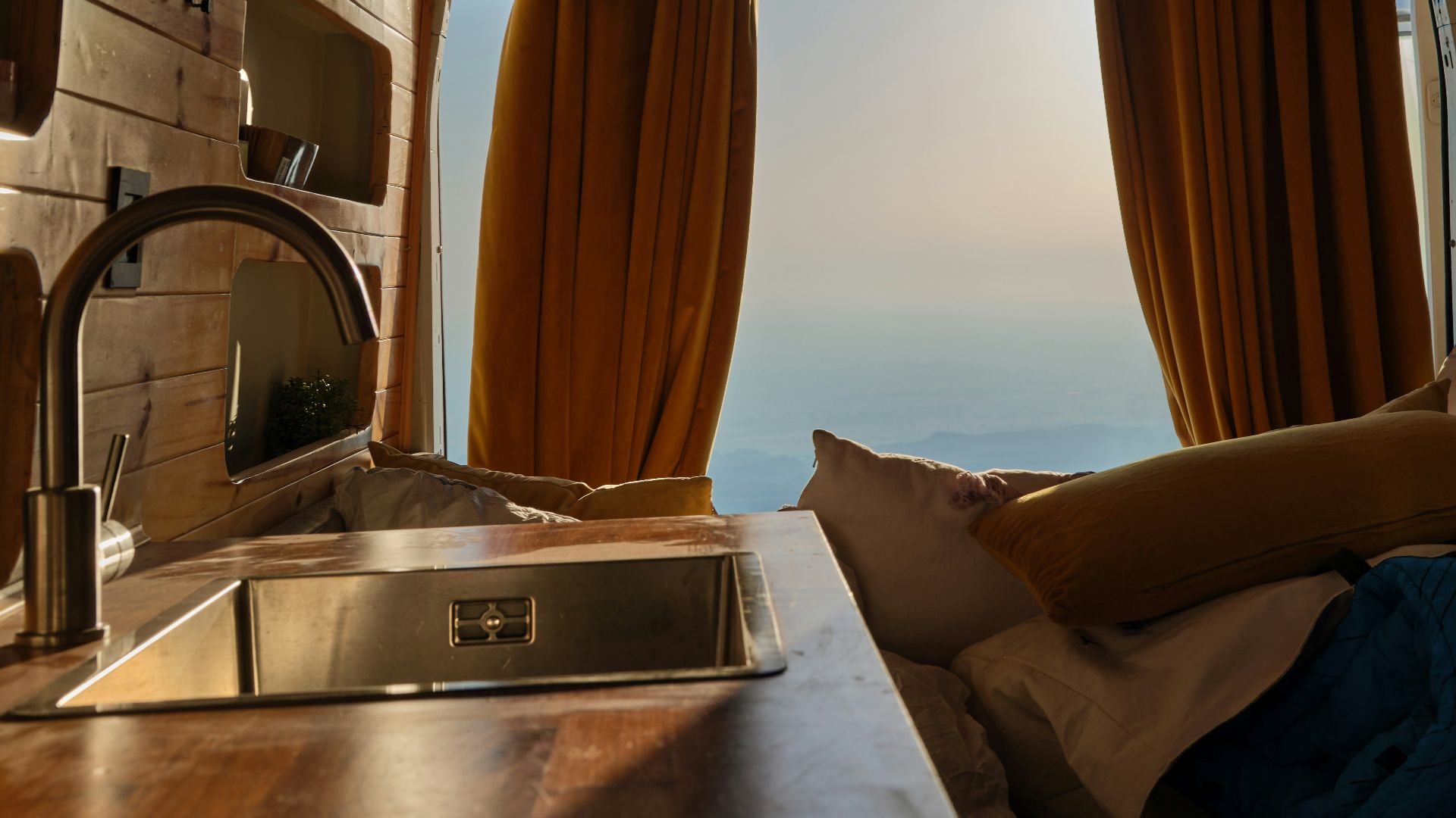 a kitchen with a sink and a window