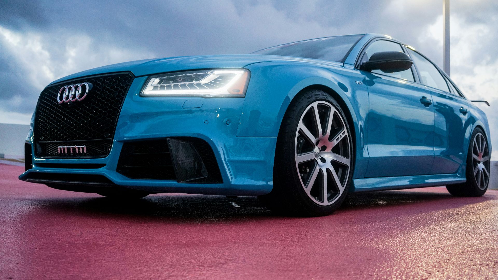 blue Audi sedan