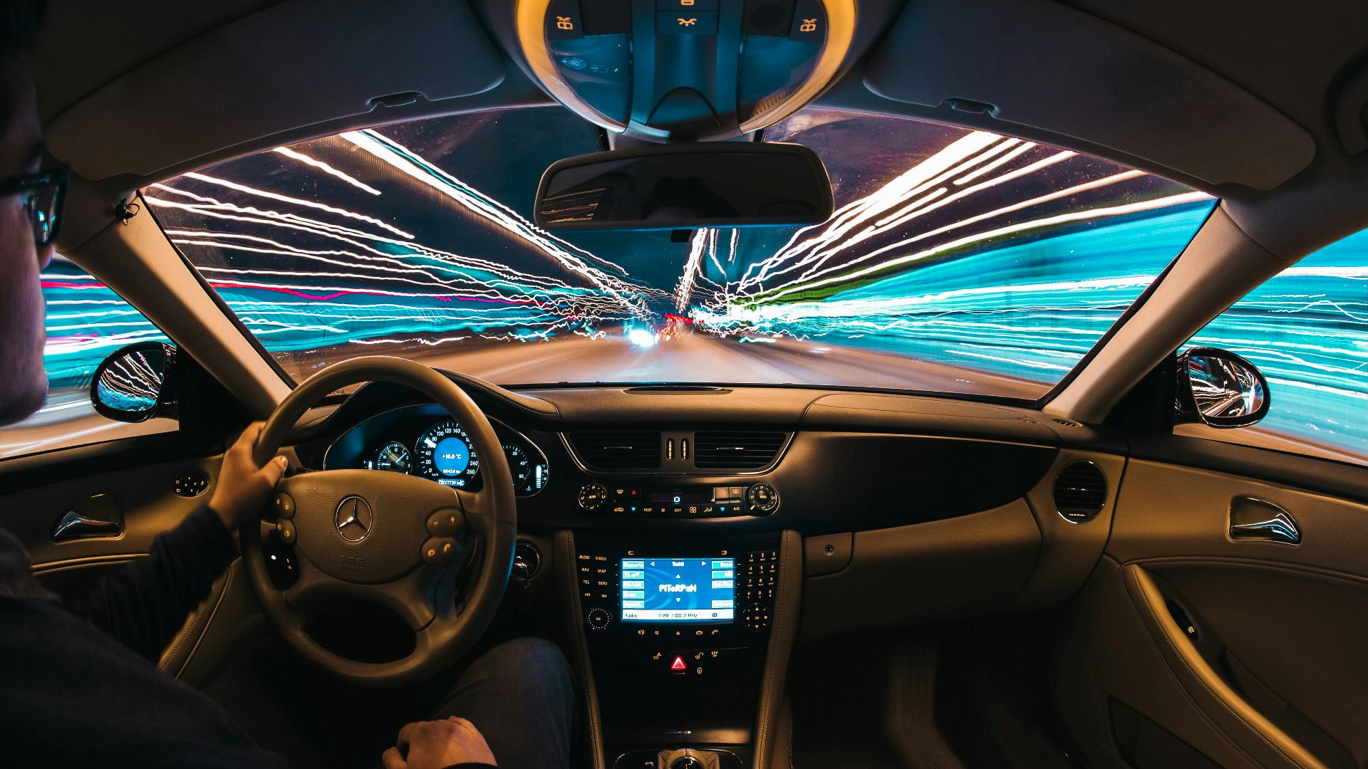 time lapse photography of man riding car