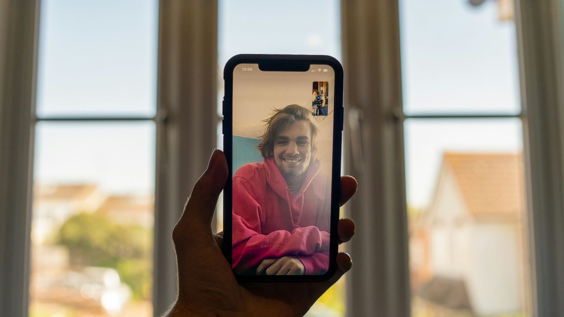 person holding black iphone 5