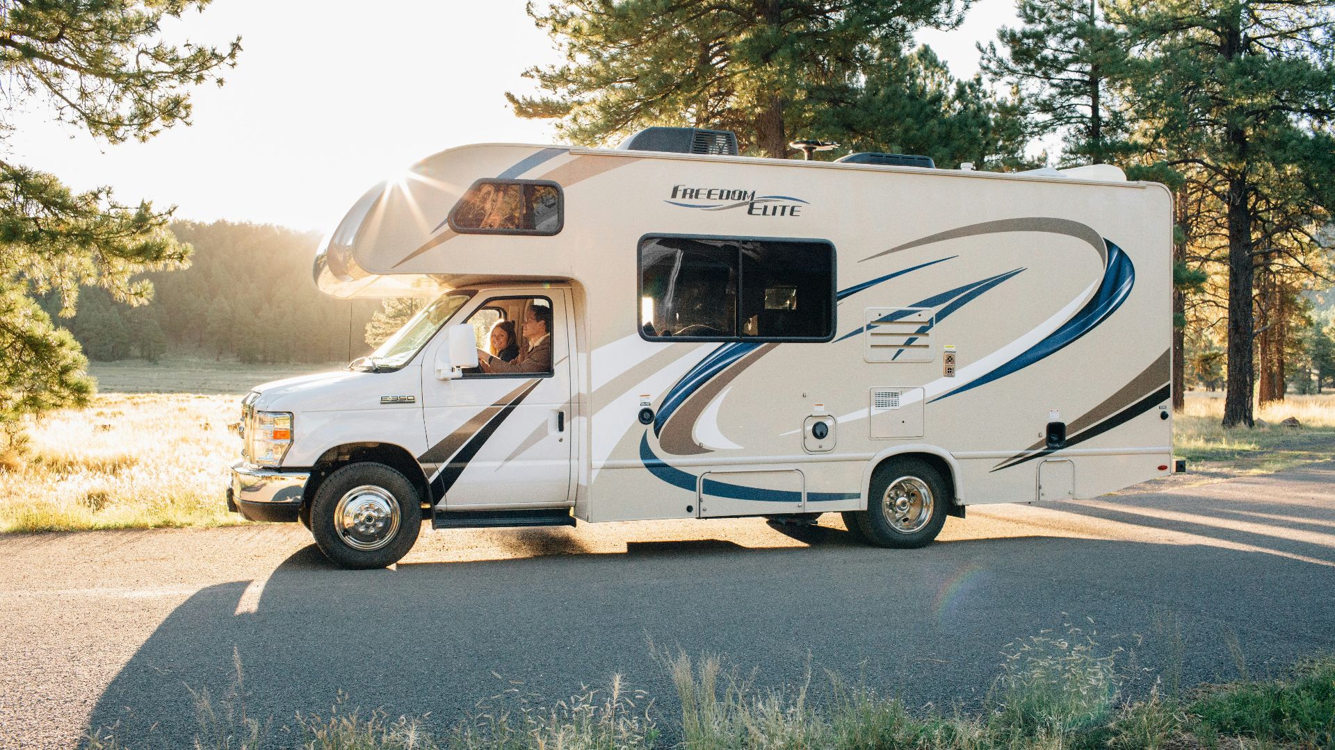white and brown van on road during daytime