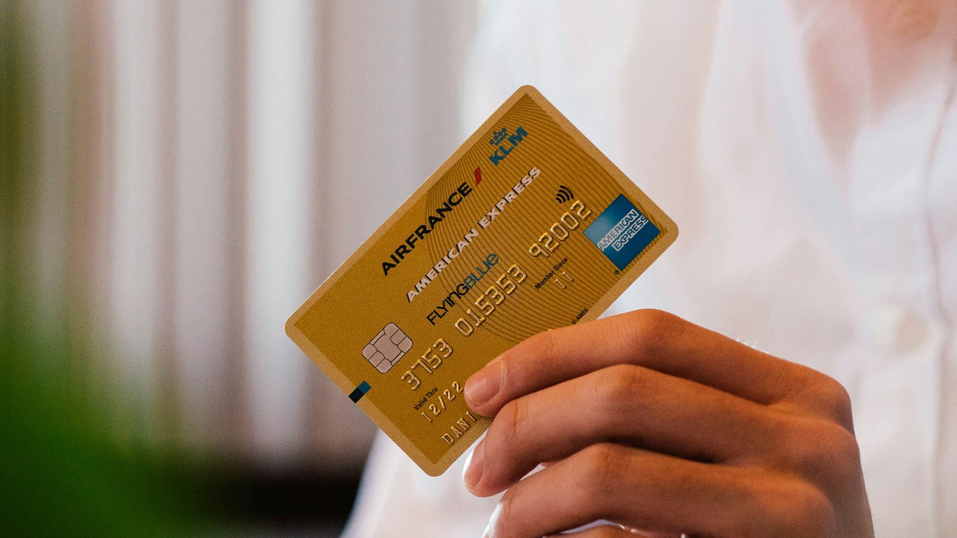 person holding credit card