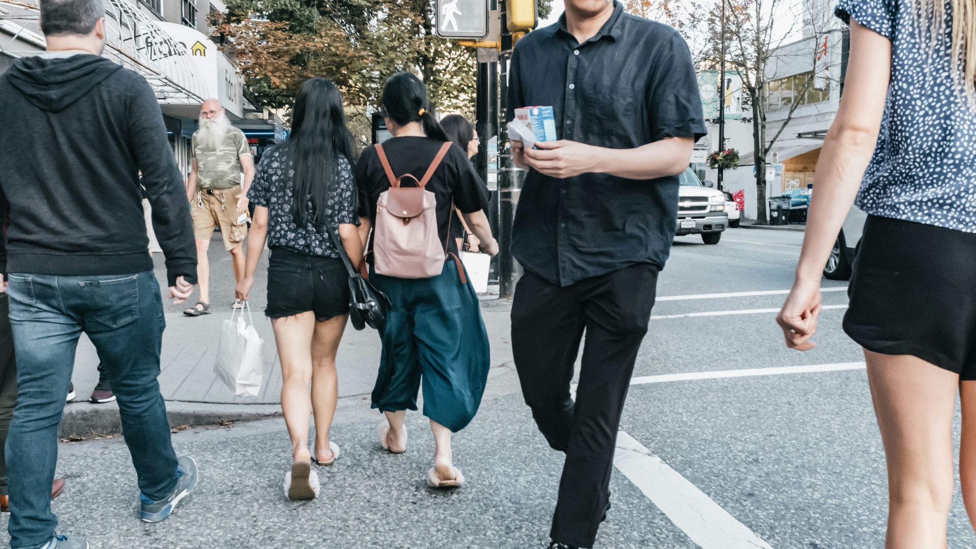 woman wears black shorts