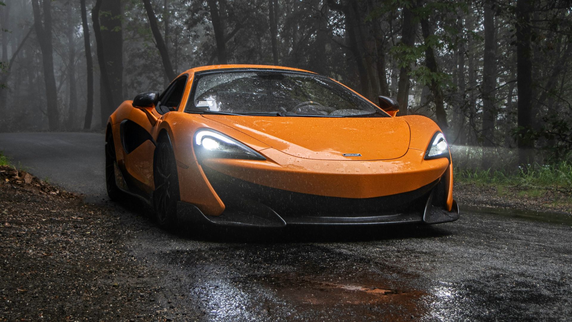 yellow lamborghini aventador on road during daytime
