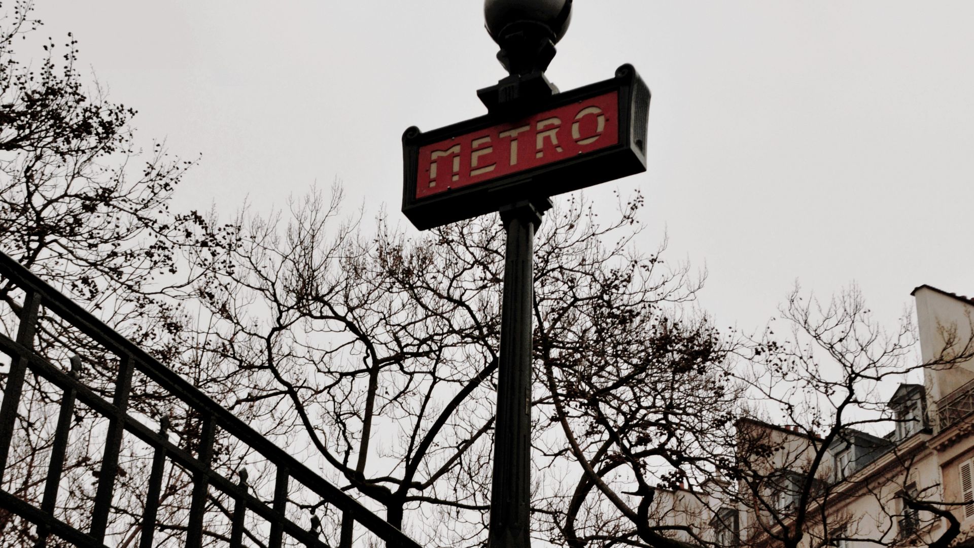 a street sign sitting on top of a metal pole