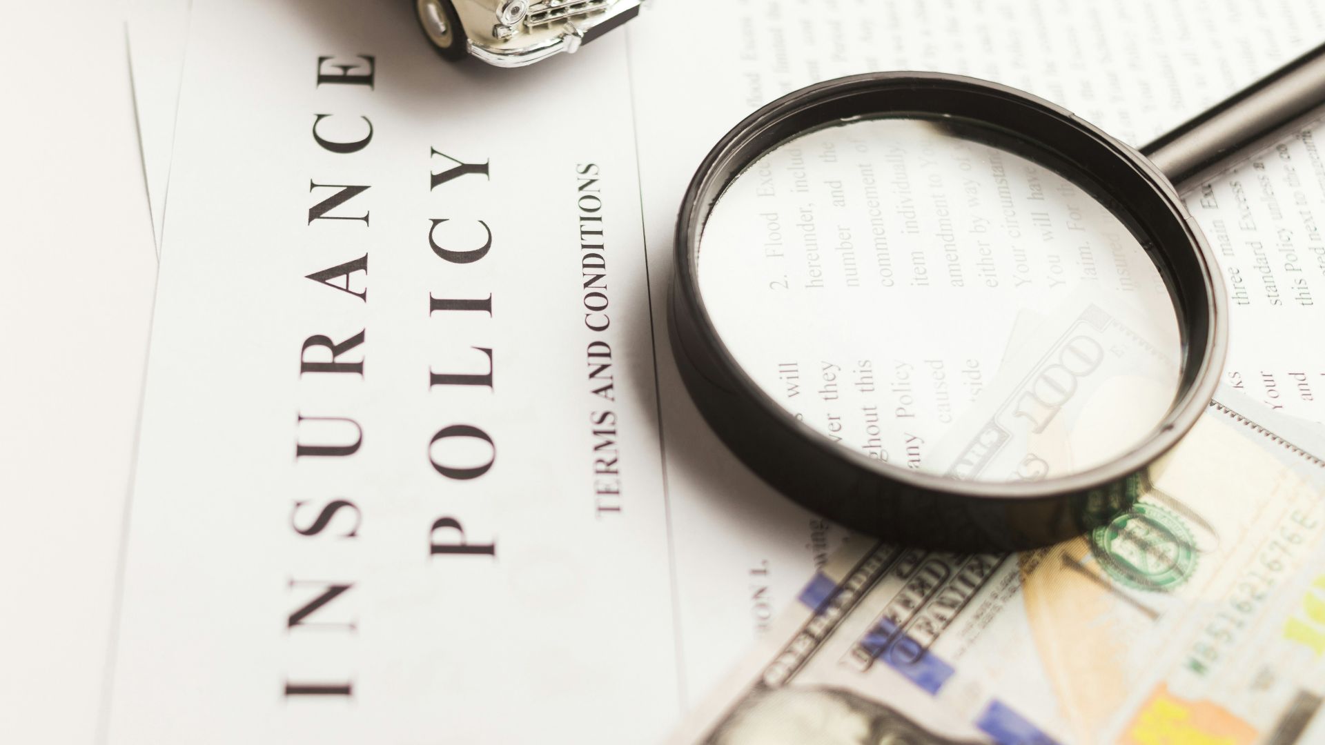 a magnifying glass sitting on top of a piece of paper