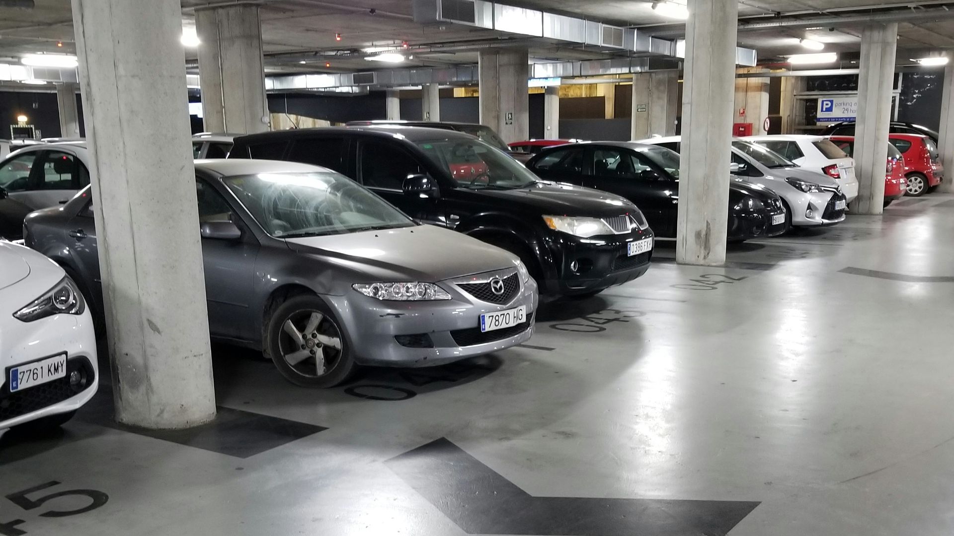 parked assorted-color cars