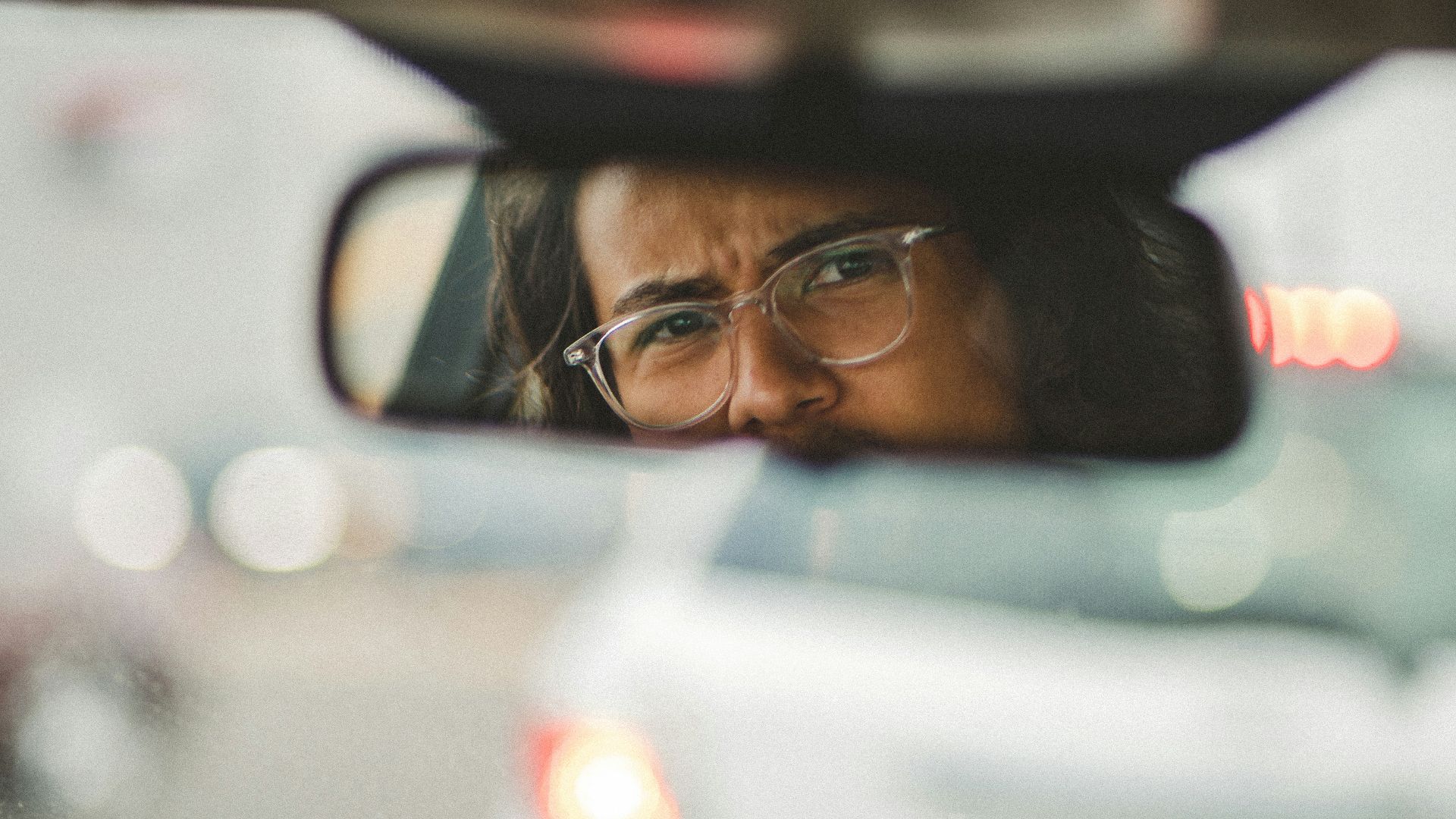 man in black framed eyeglasses