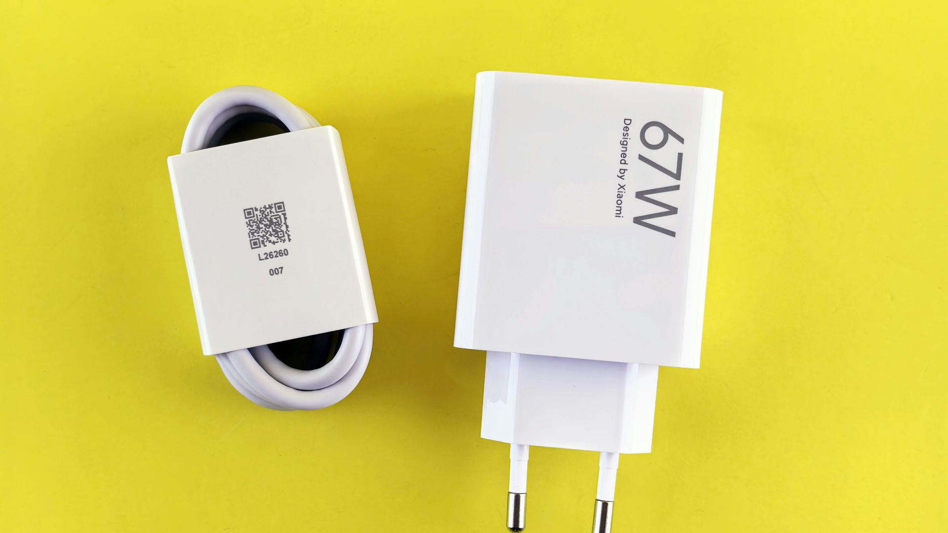 A couple of white wires sitting next to each other