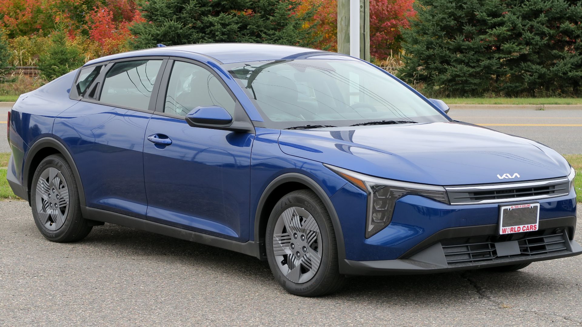 File:2025 Kia K4 LX in Azure Blue, front right, 2024-10-12.jpg