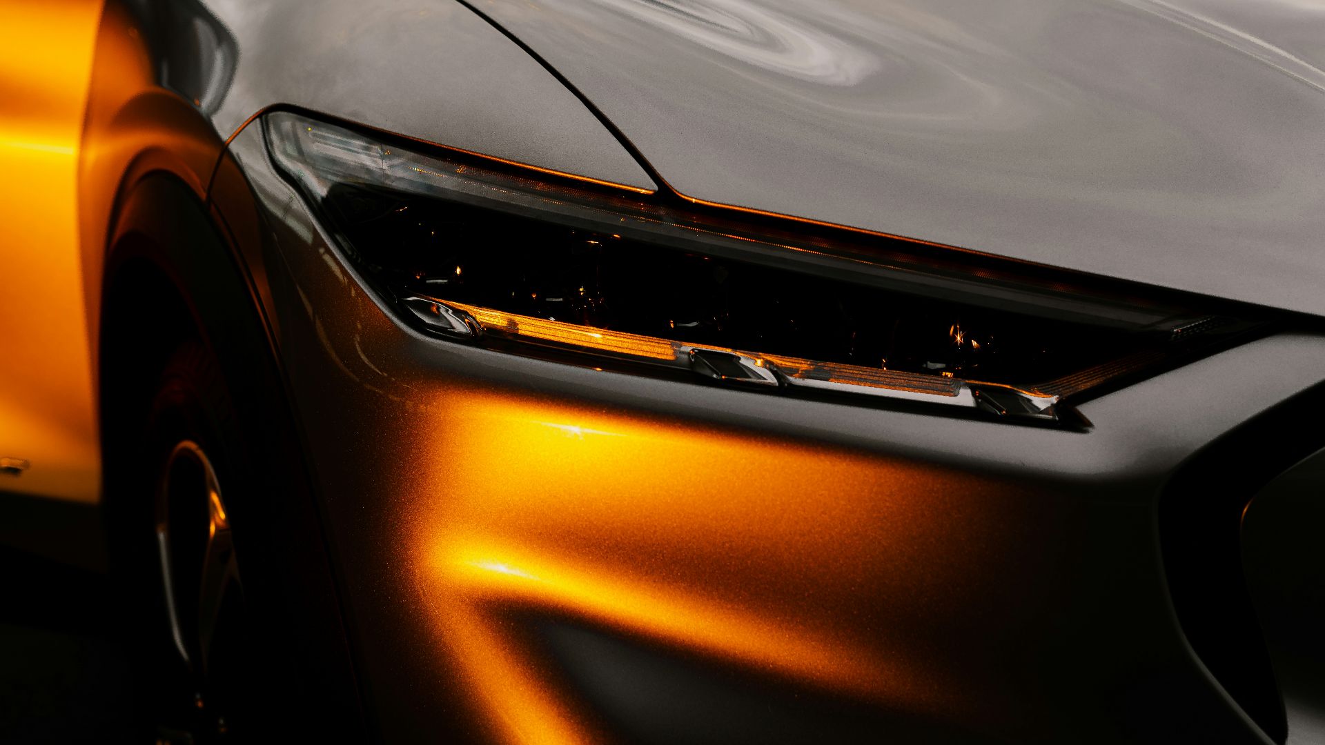 orange car in close up photography