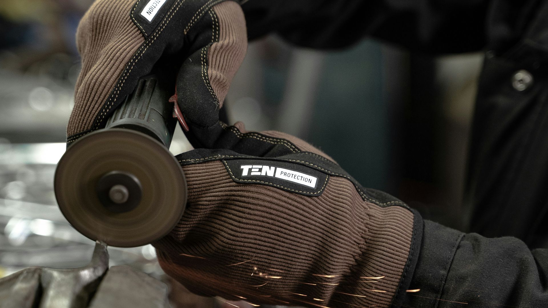 a man working on a piece of metal