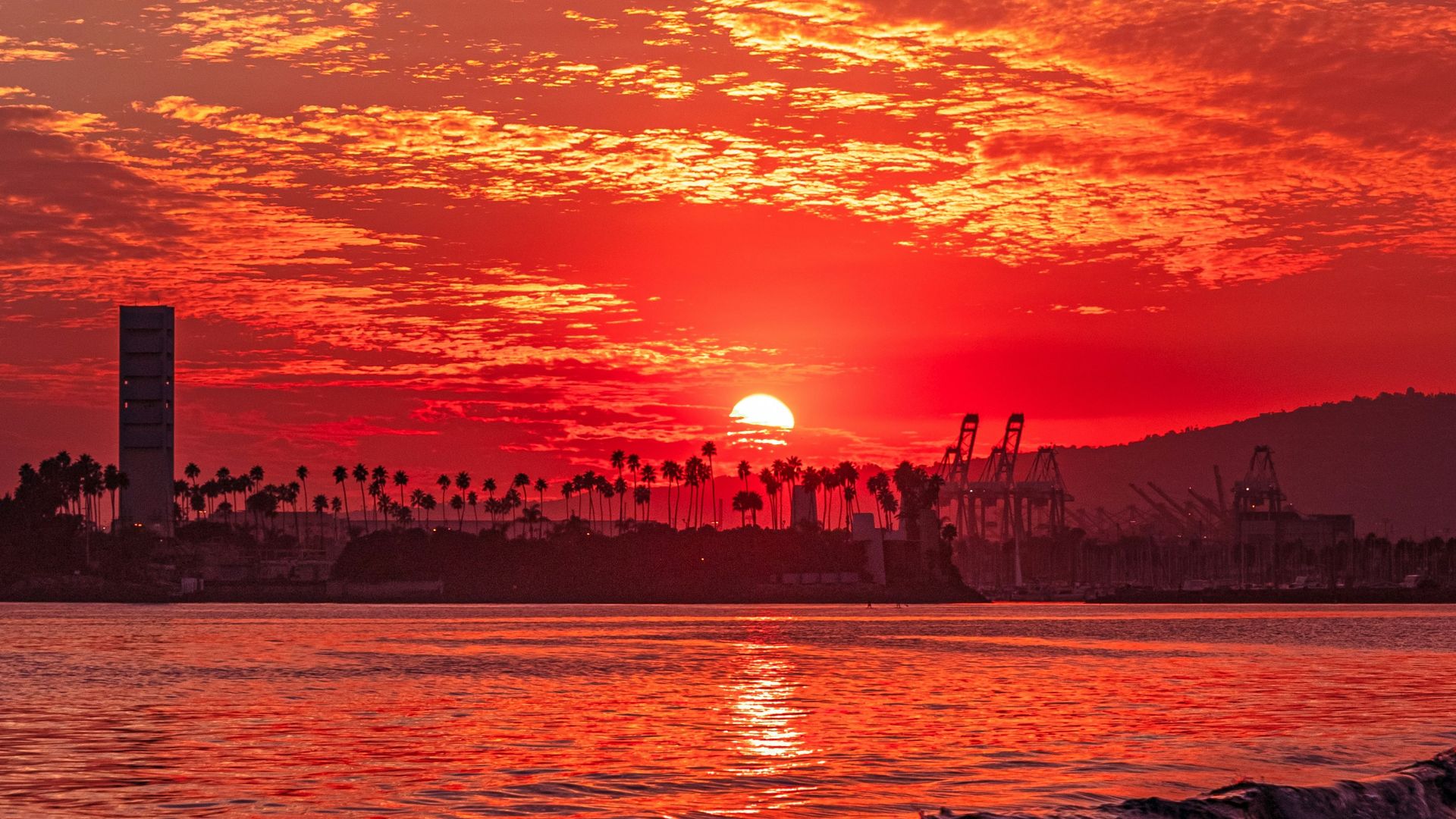 silhouette of city skyline during sunset