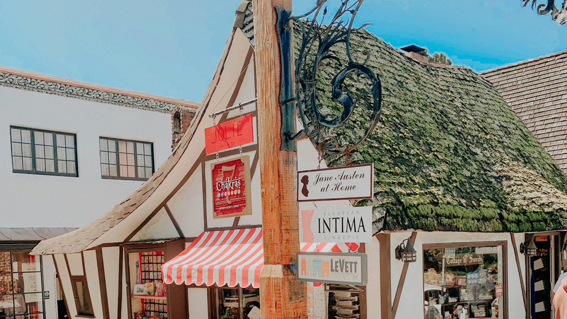 white and green store during daytime