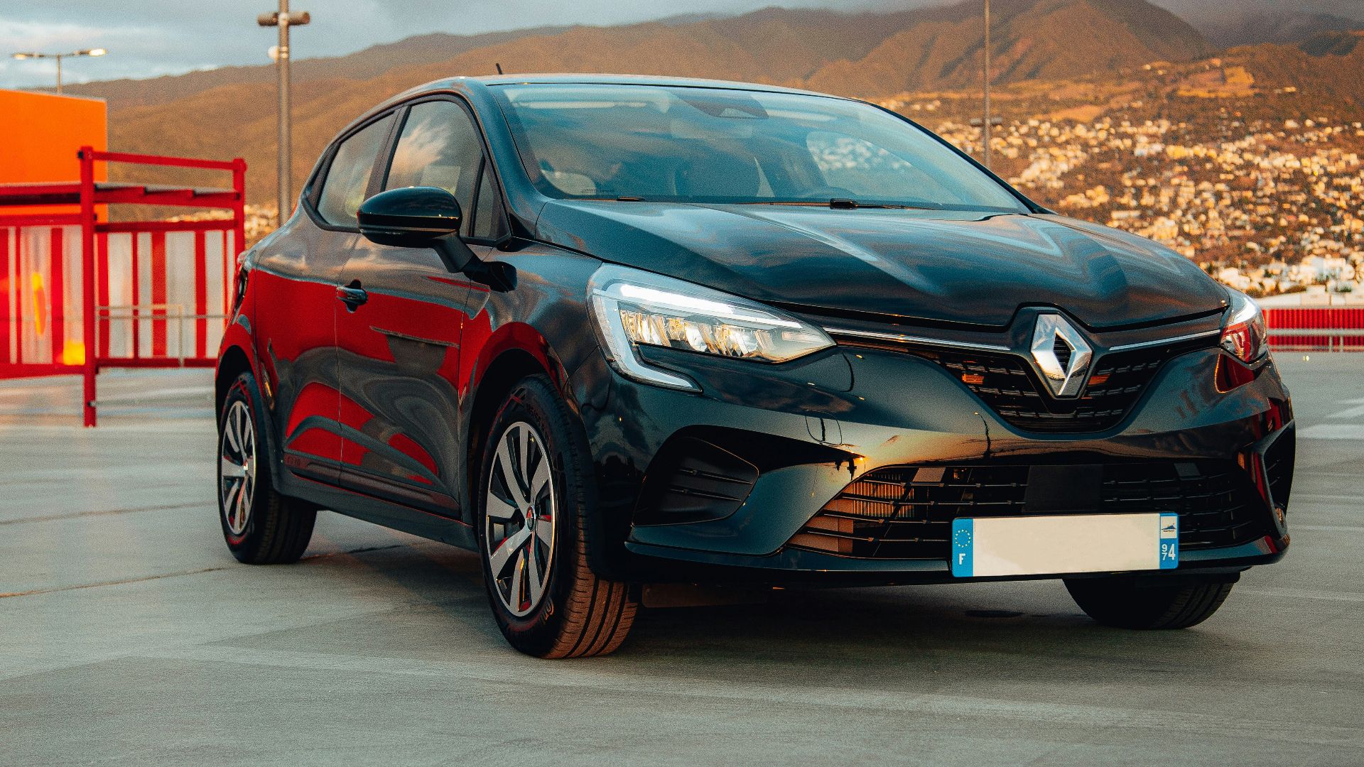 a black car parked on a road