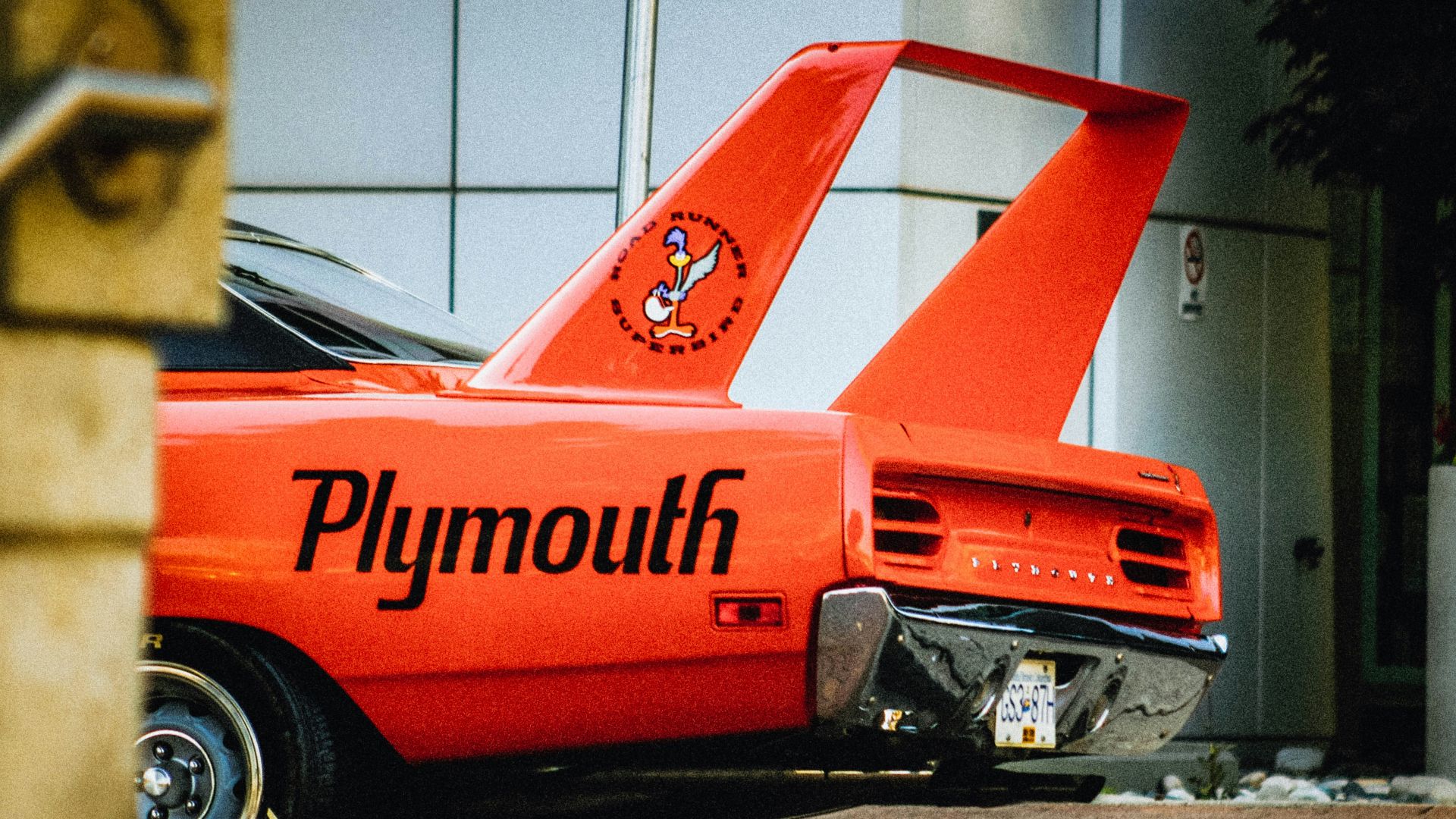 red and black chevrolet camaro