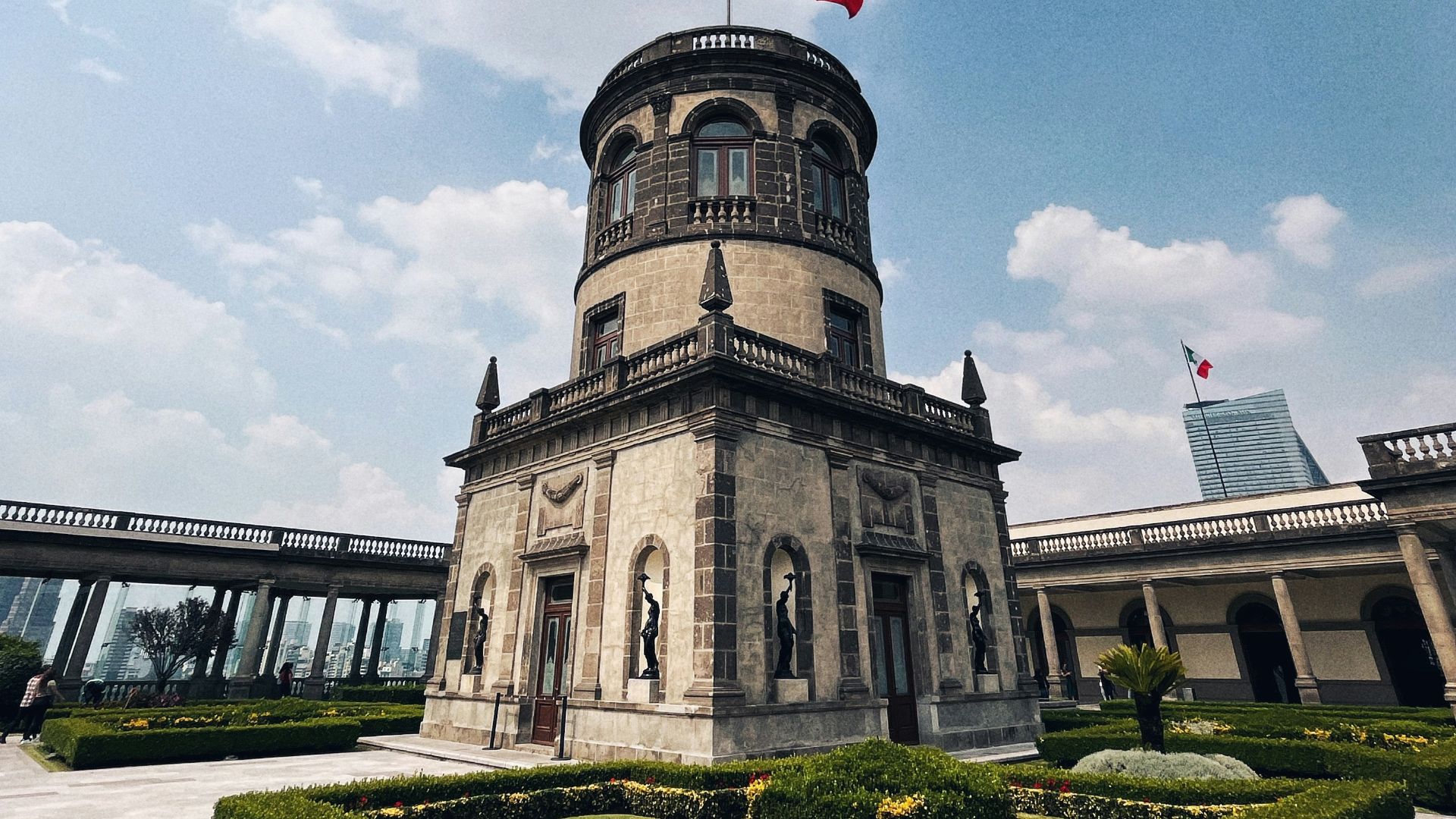 a large building with a flag on top of it