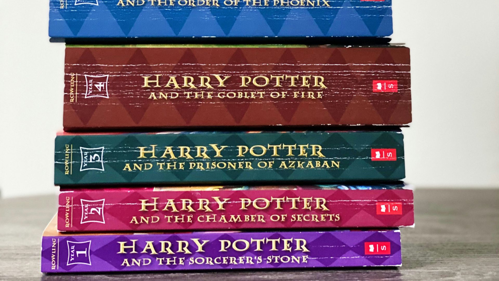 stack of books on white table