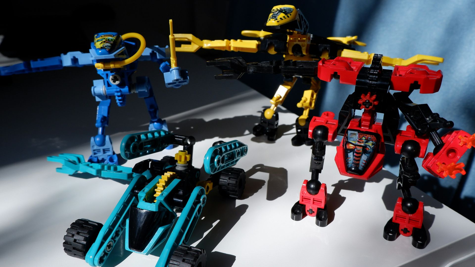 a group of toy cars sitting on top of a table