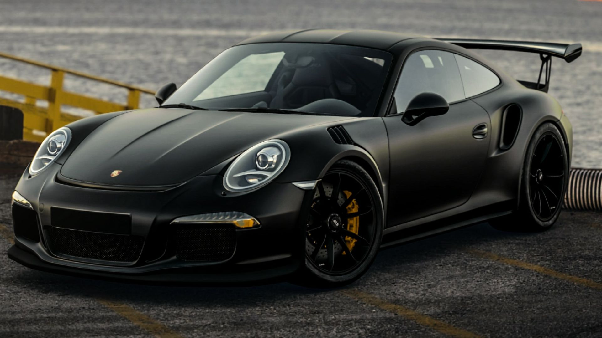 black porsche 911 on road during daytime