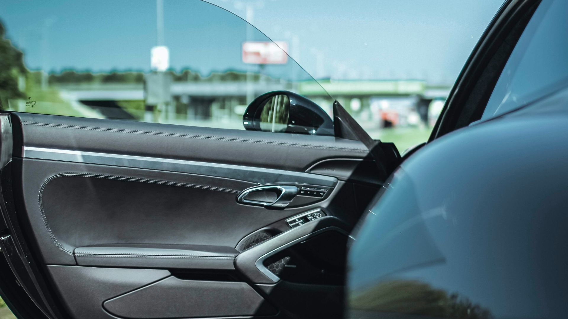 opened black vehicle's door