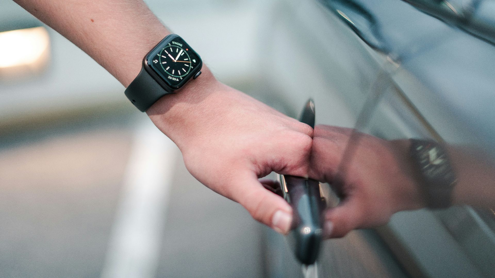 person wearing black digital watch