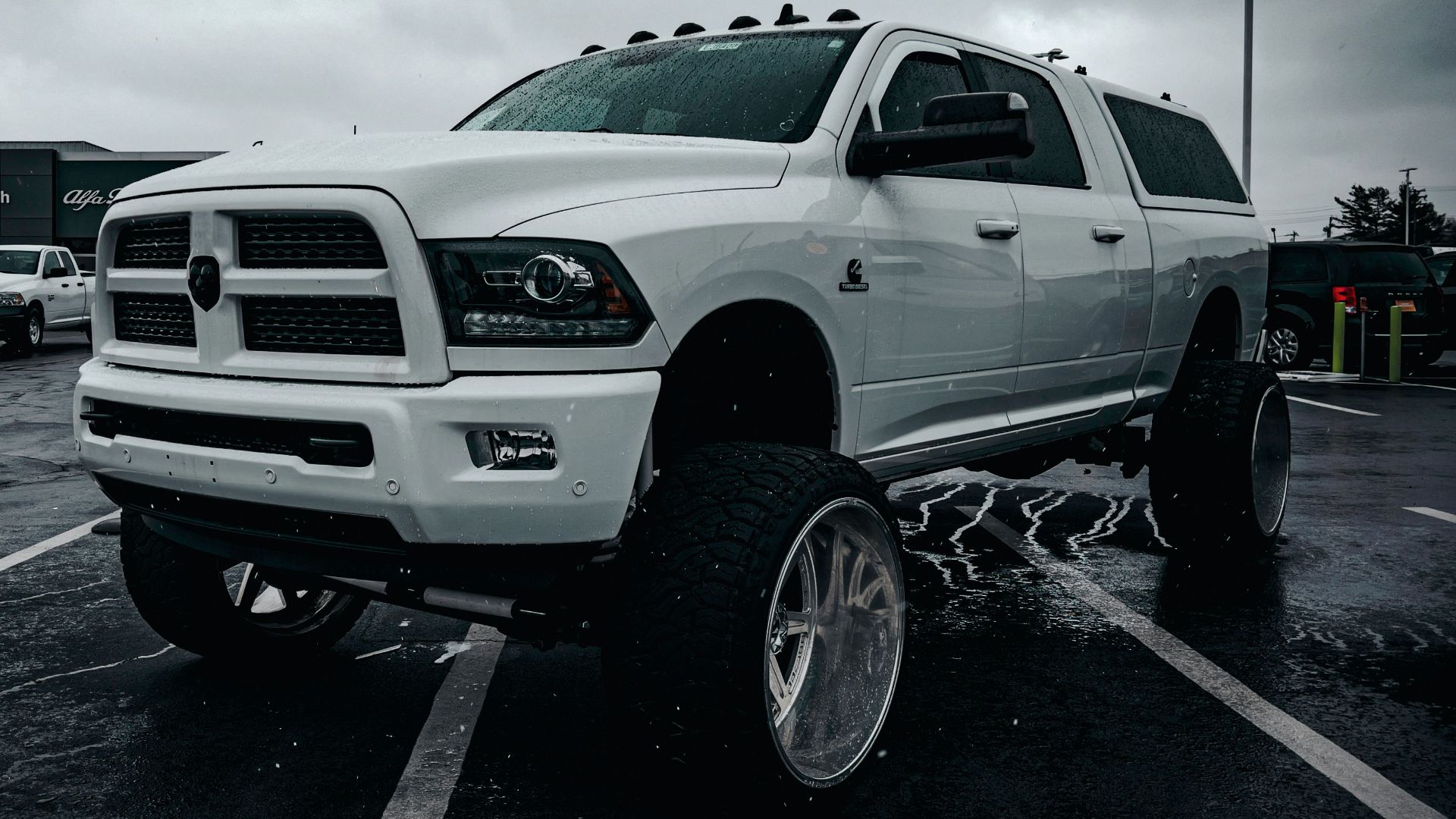a large white truck parked in a parking lot