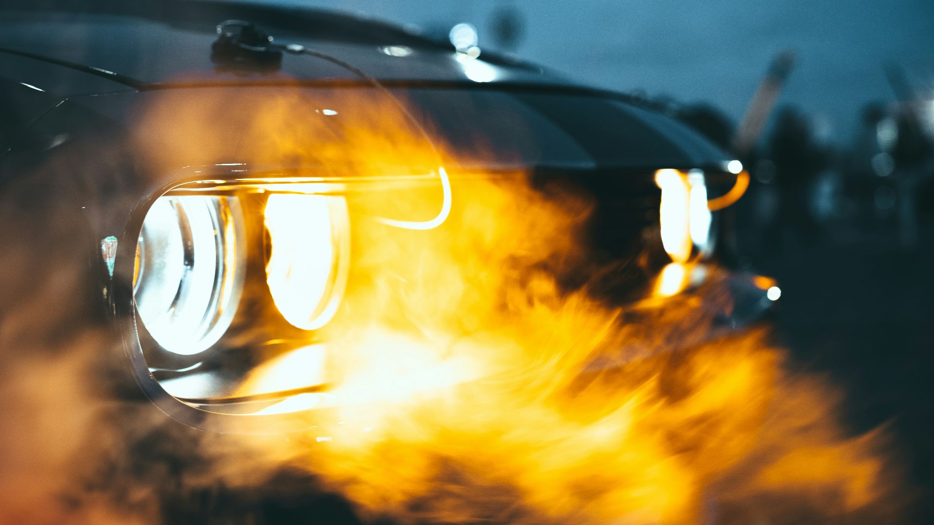 black car with yellow lights