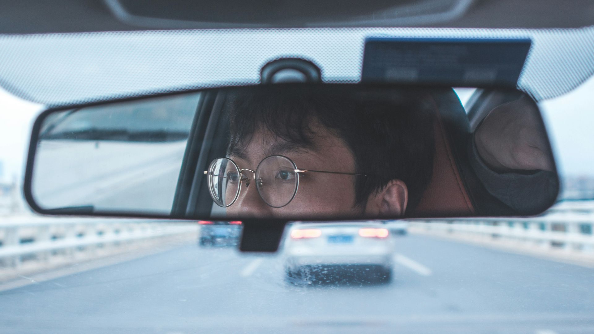 woman in black framed eyeglasses