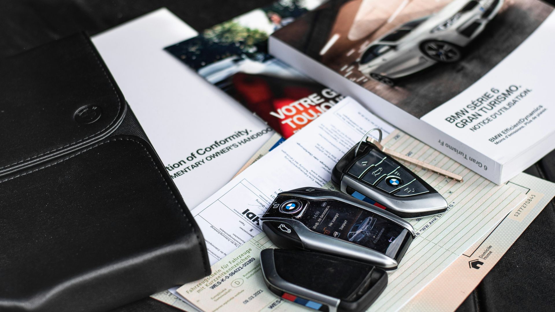 a couple of cell phones on a table