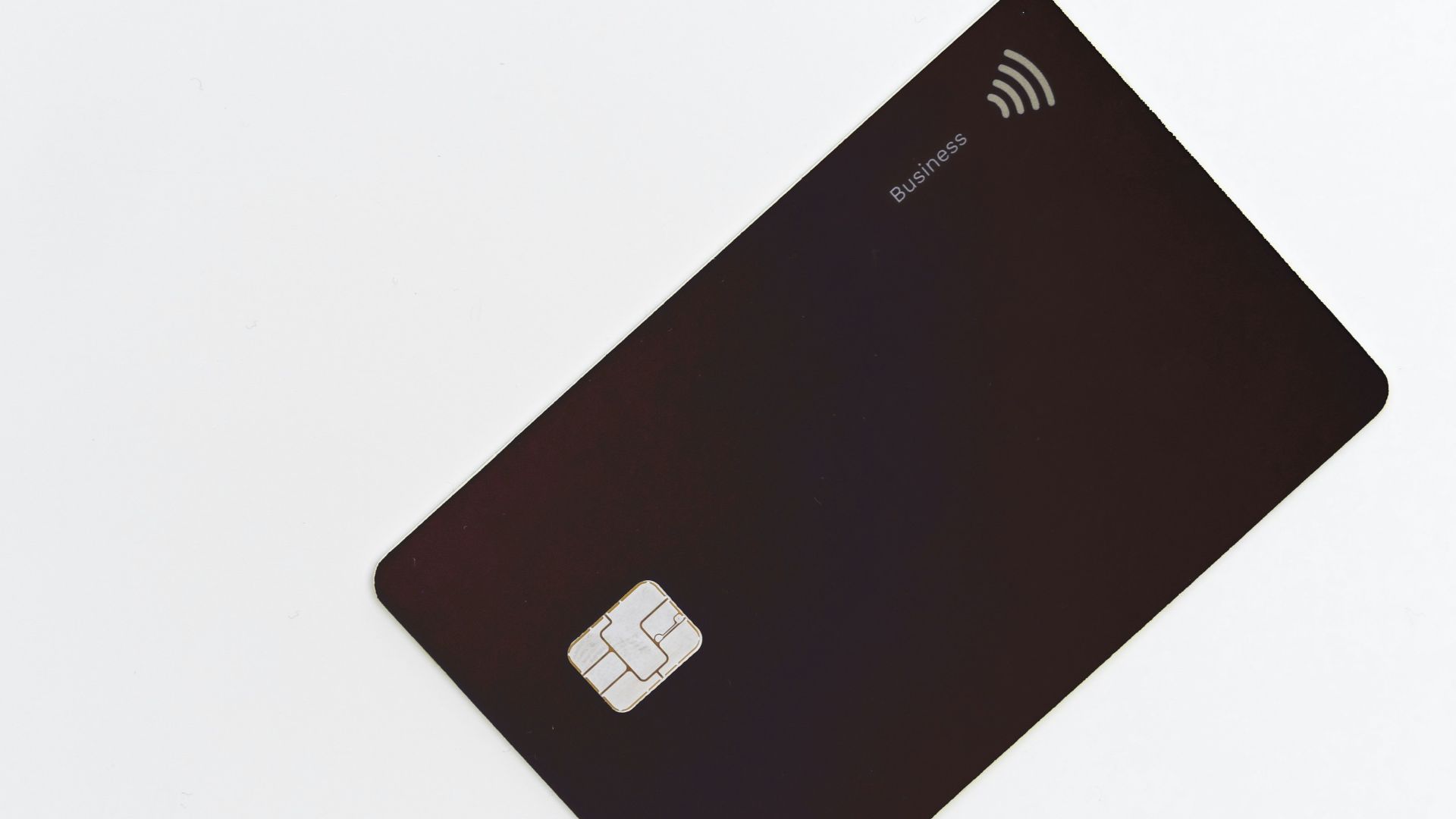 black asus laptop computer on white surface