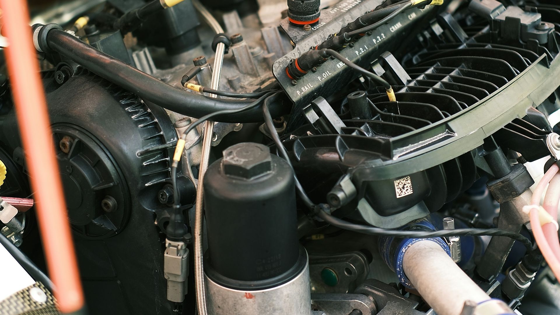 the engine compartment of a car with the hood open