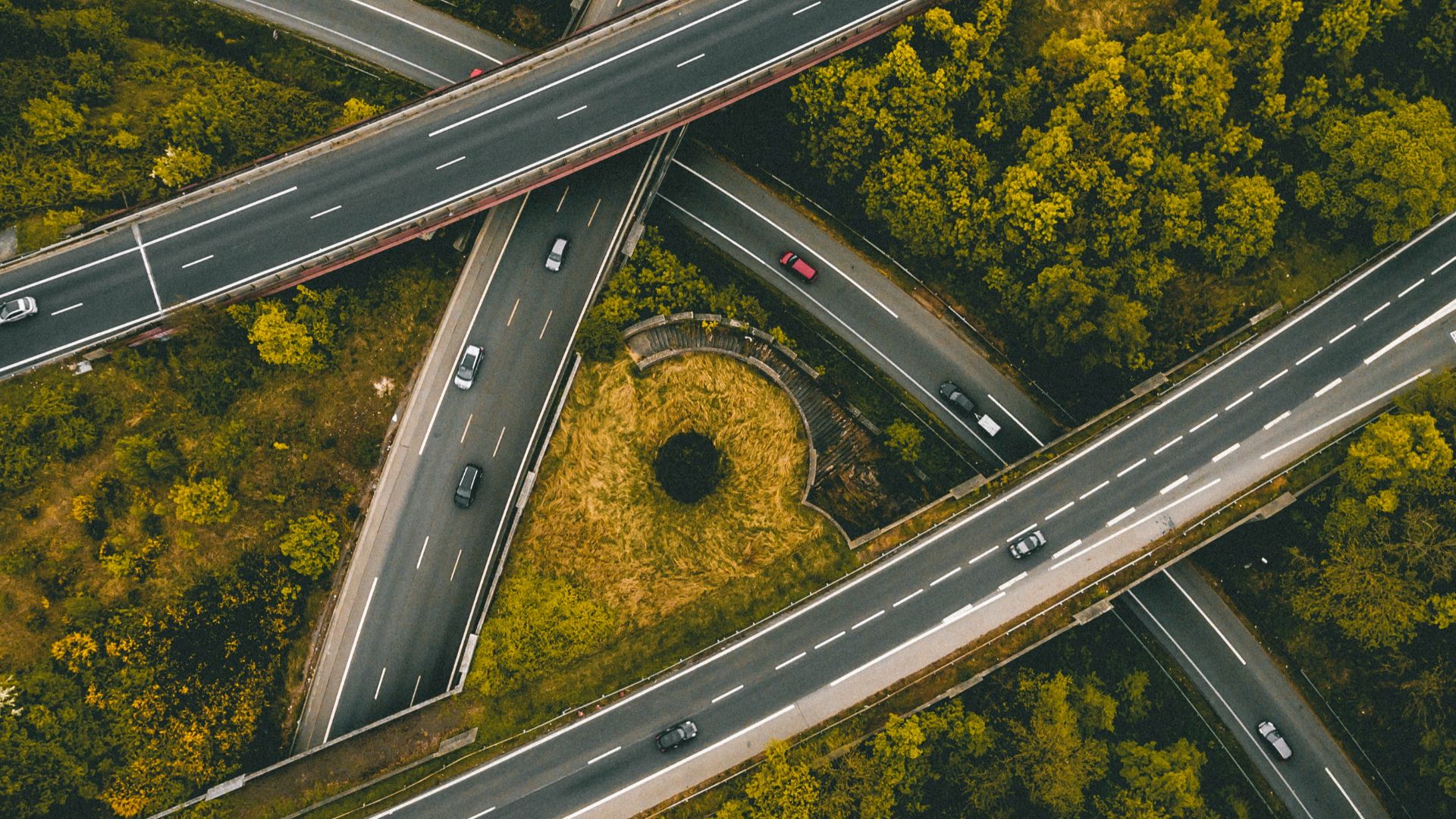 aerial photography of interlocking freeways with travelling cars