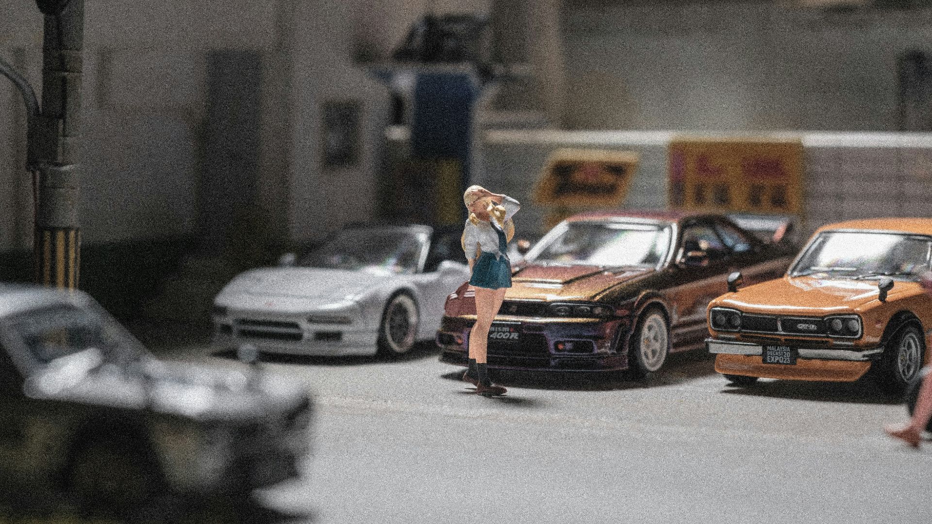 A group of cars that are sitting in the street