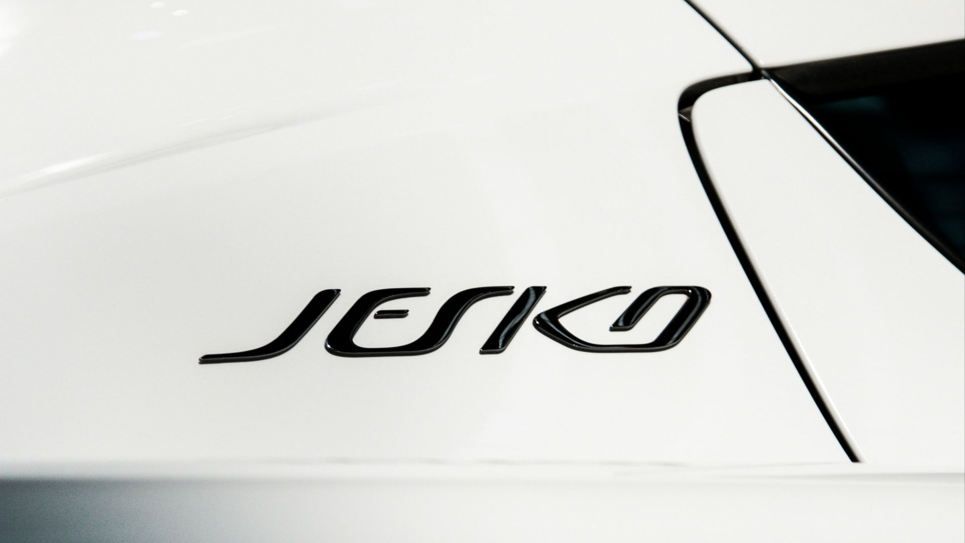a close up of a white sports car