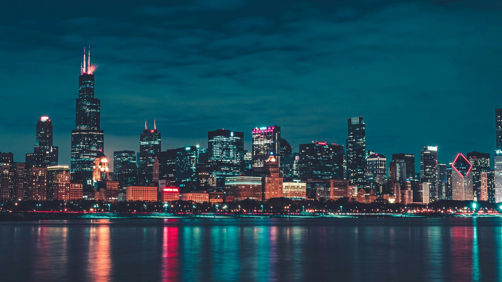 city skyline during night time