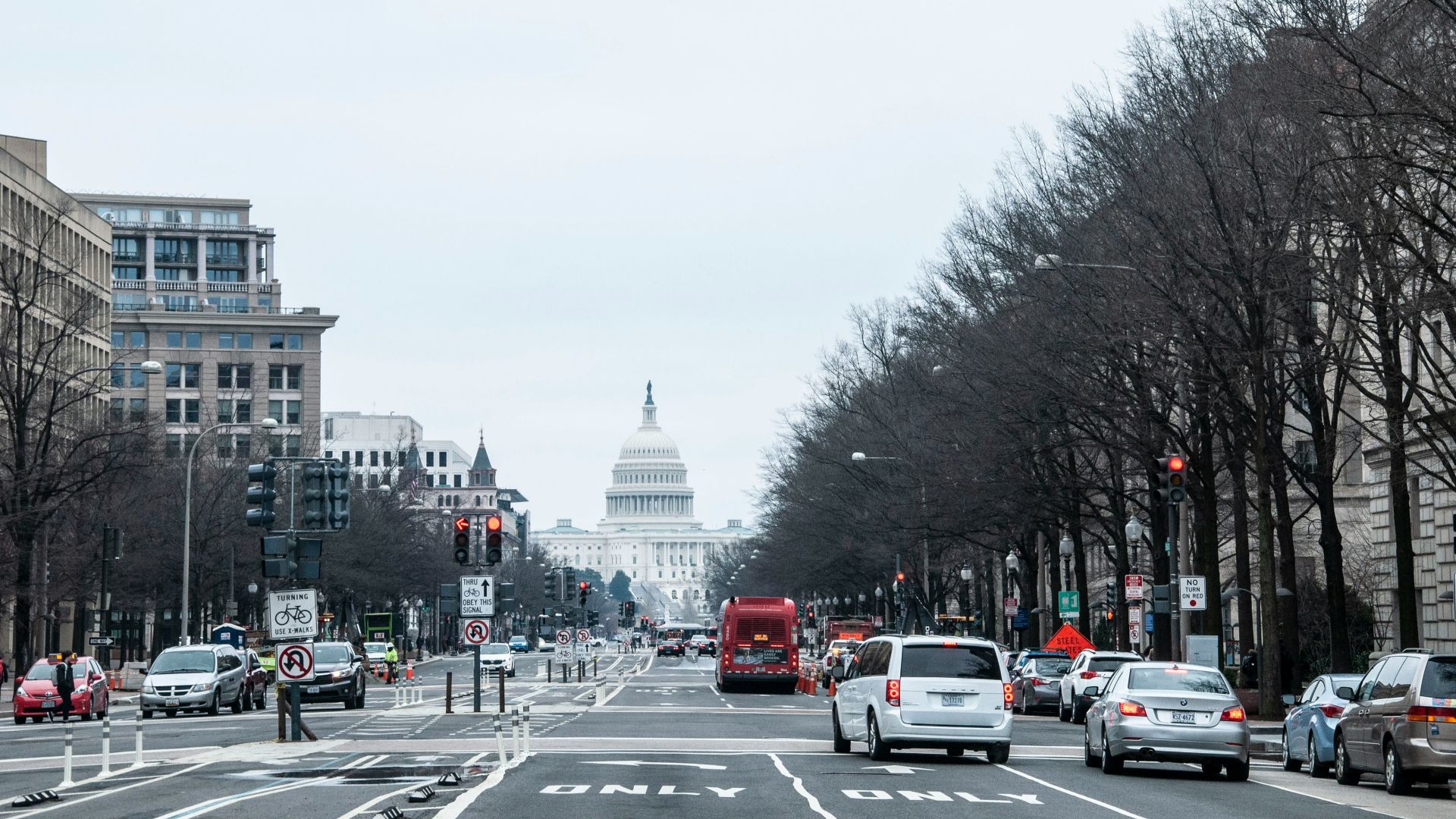 vehicles on road during daytime