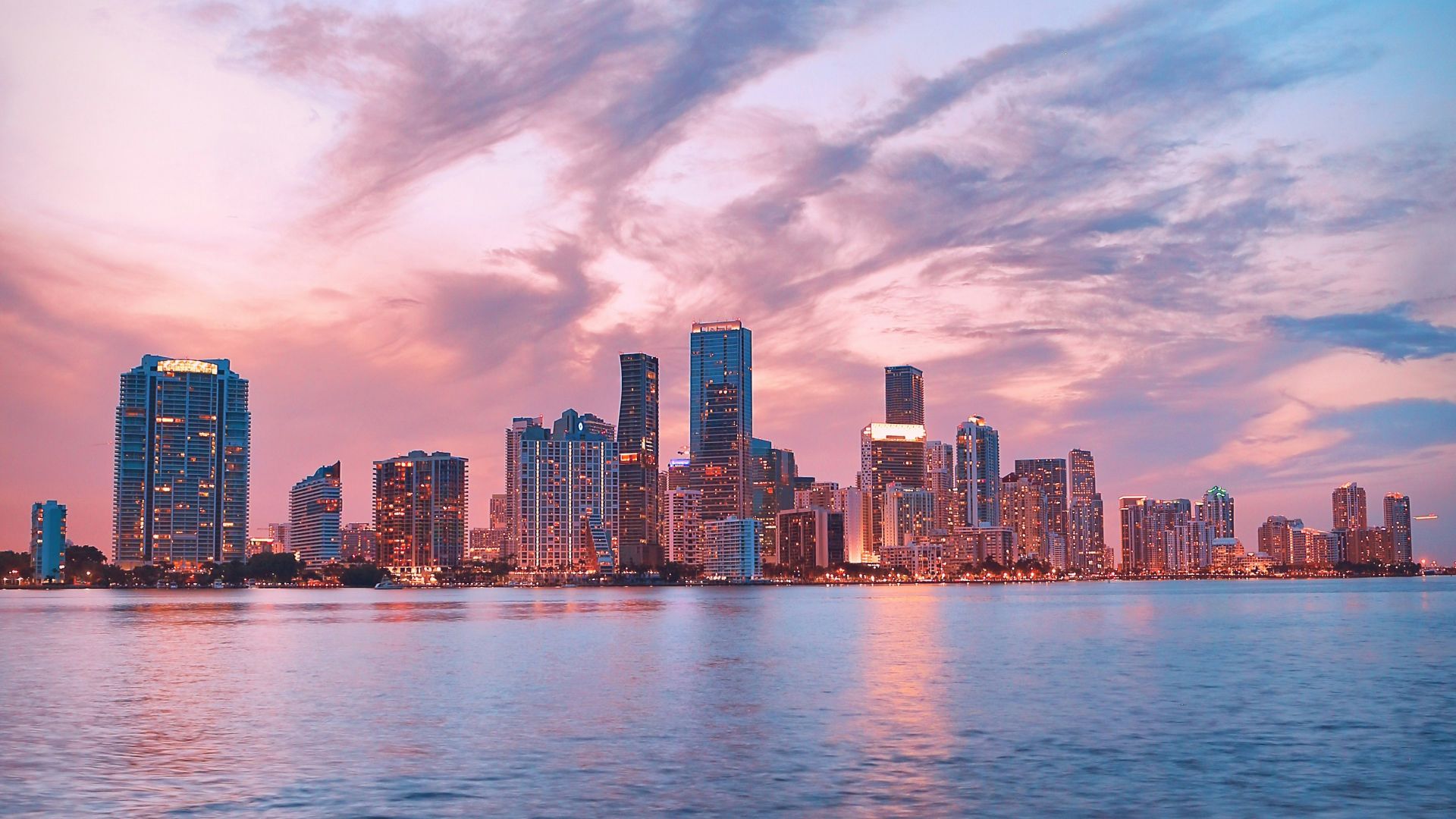 body of water near of city high-rise buildings