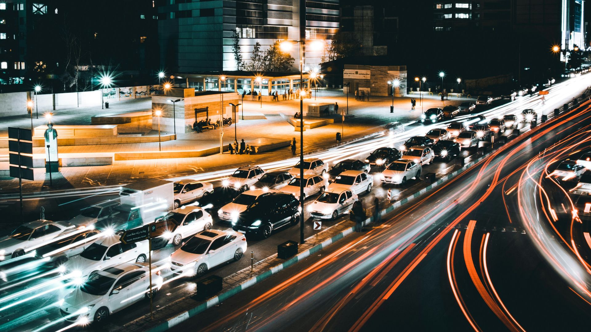 time lapse photography of cars on road during night time