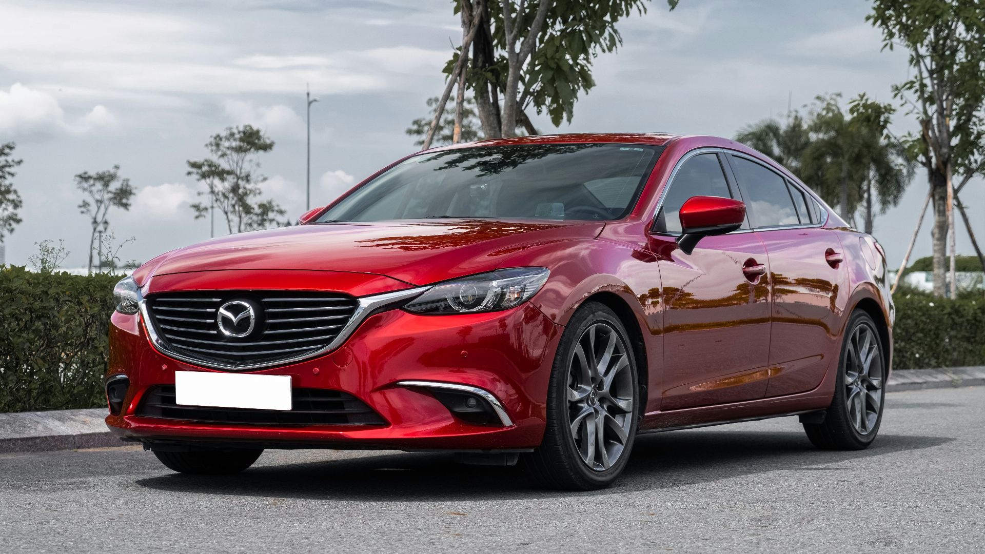 a red car parked on a street