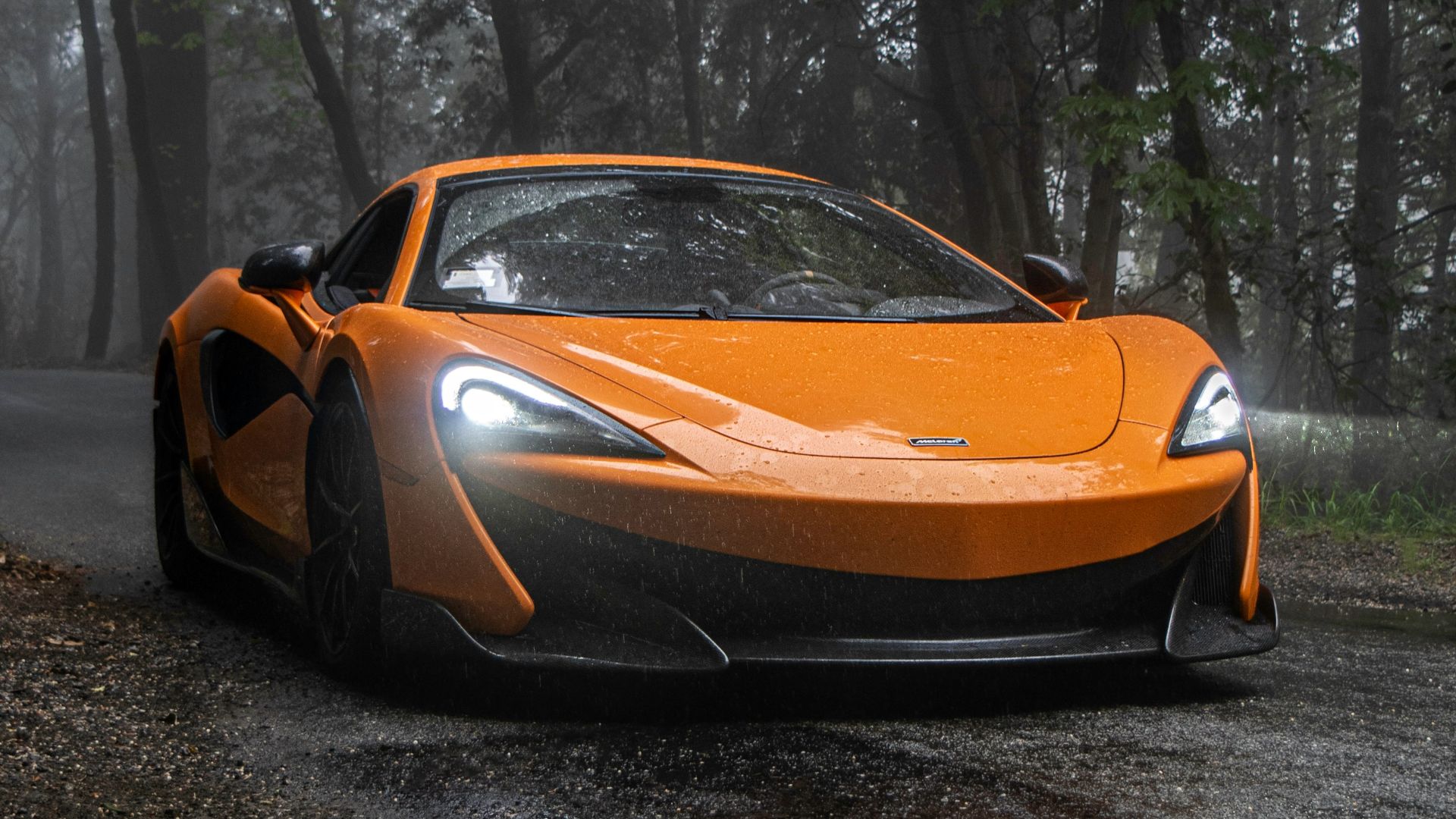 yellow lamborghini aventador on road during daytime