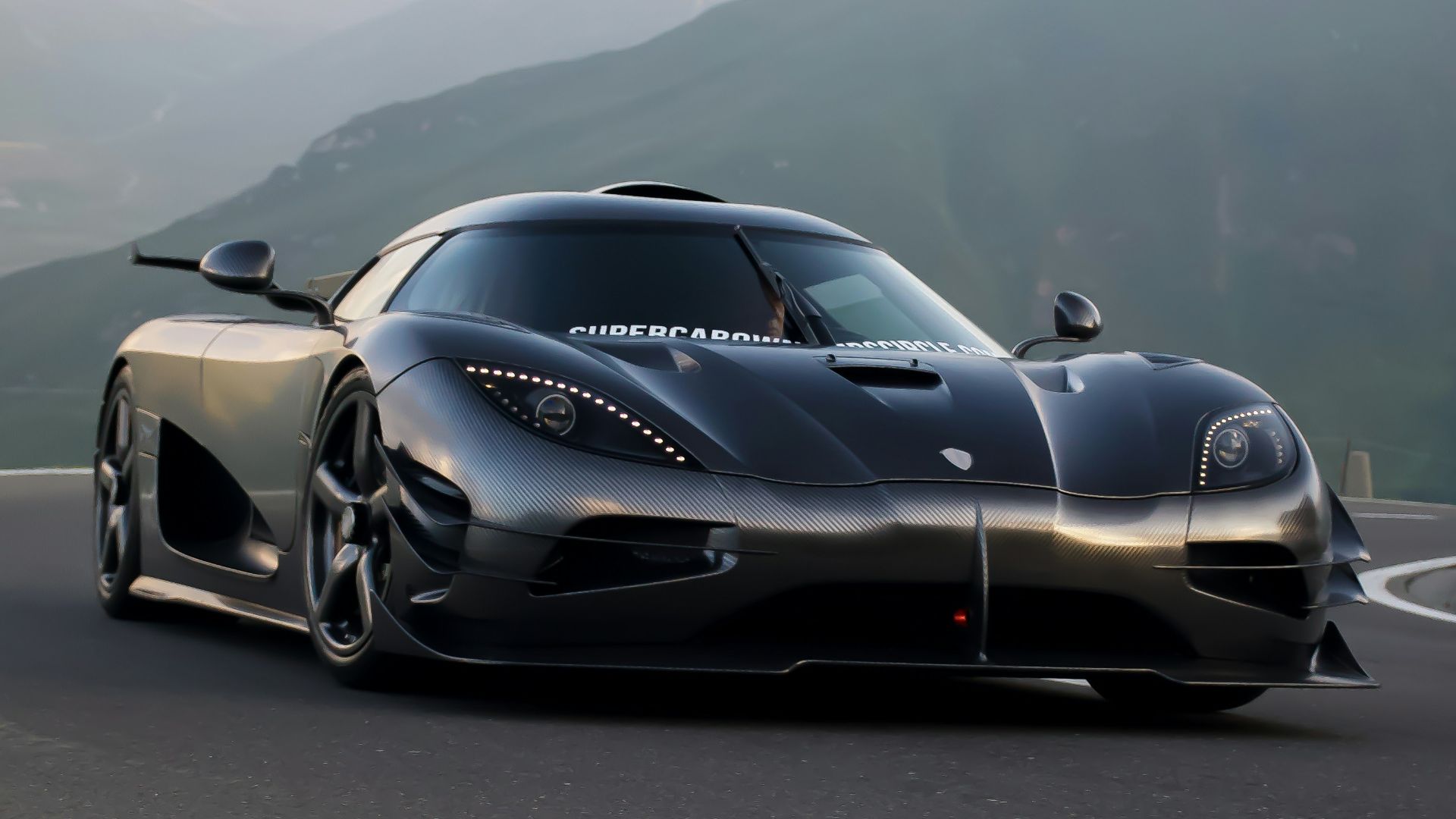 black porsche 911 on road during daytime