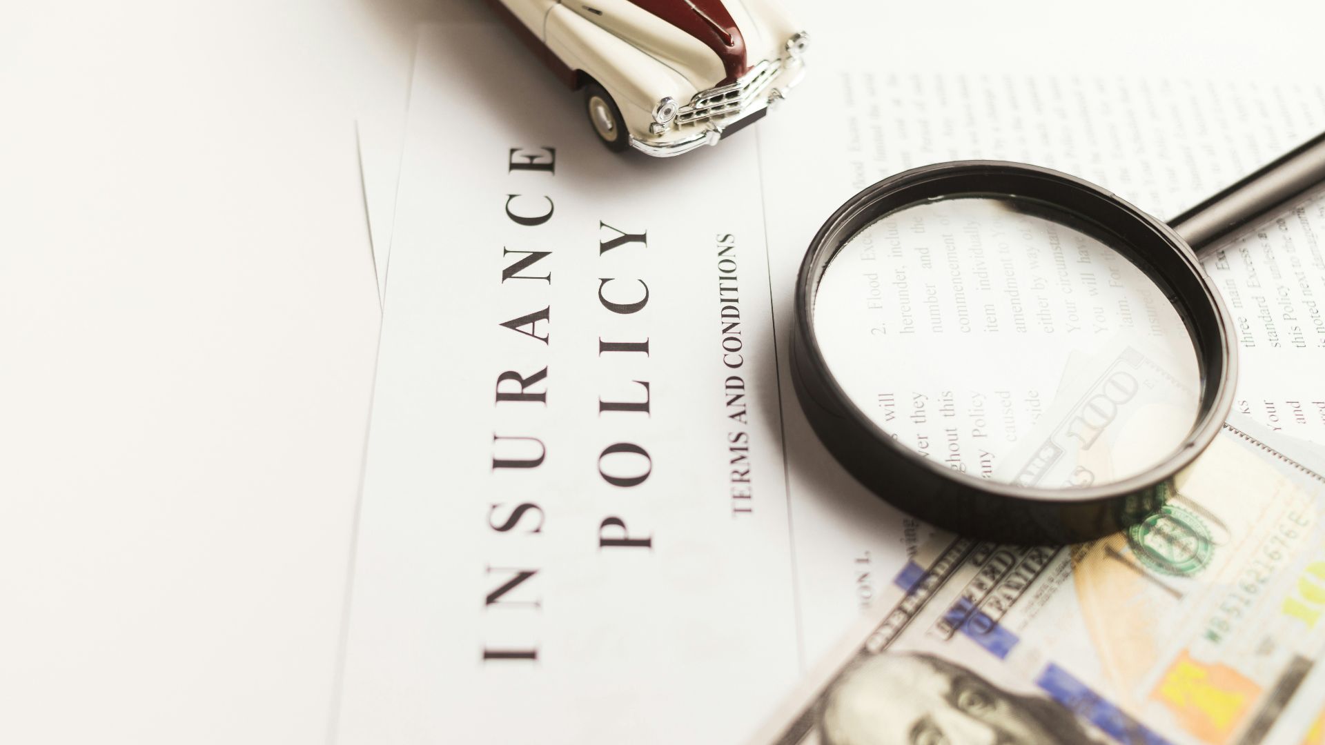 a magnifying glass sitting on top of a piece of paper