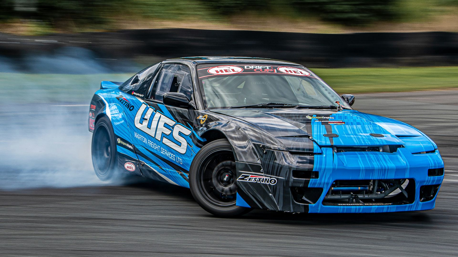 a blue race car on a track