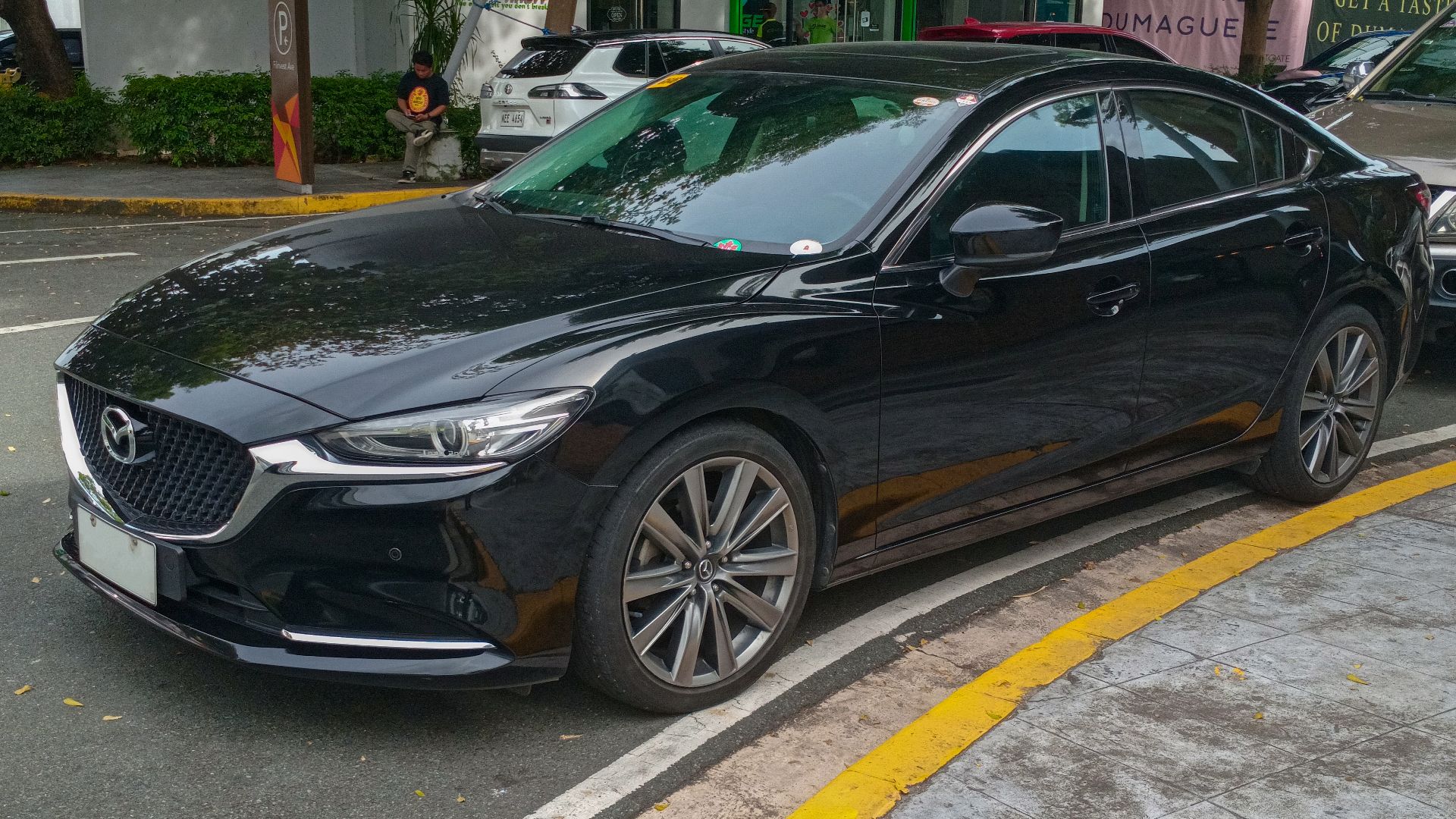 File:2019 Mazda6 2.5 Skyactiv-G Turbo sedan in Jet Black, front left.jpg