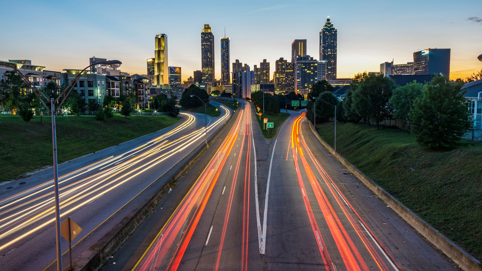 timelapse photo of highway during golden hour